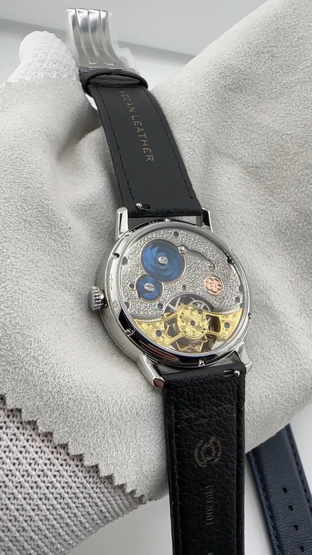 Ji Chen 001 · gem-set & engraved back