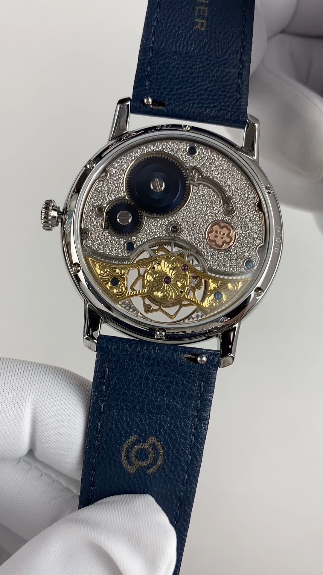 Ji Chen 001 · gem-set & engraved back