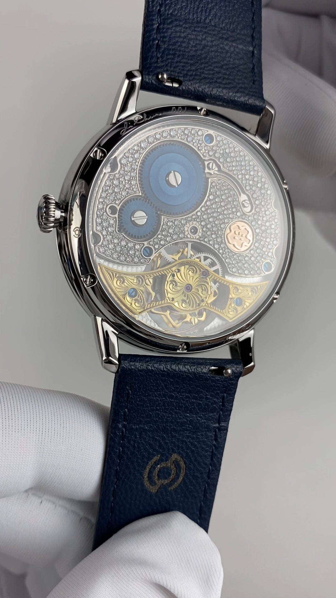 Ji Chen 001 · gem-set & engraved back