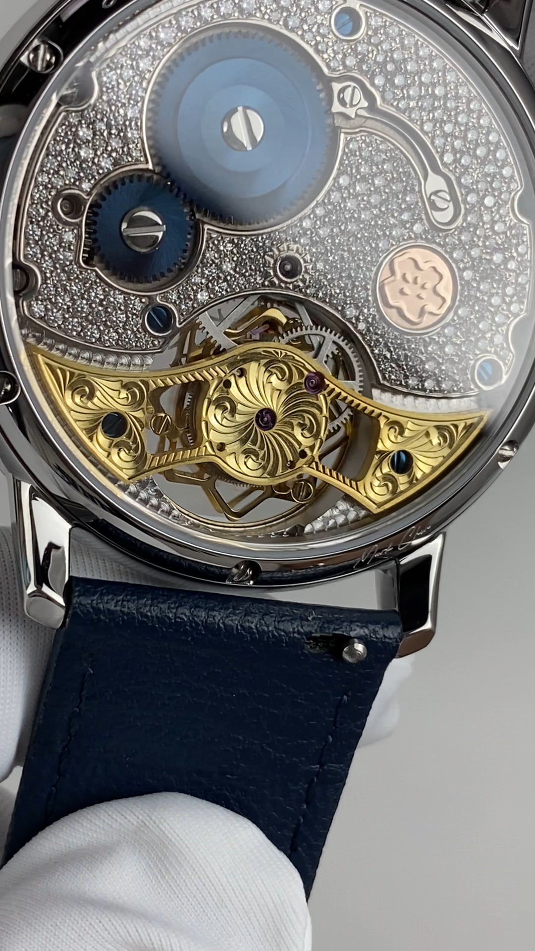 Ji Chen 001 · gem-set & engraved back