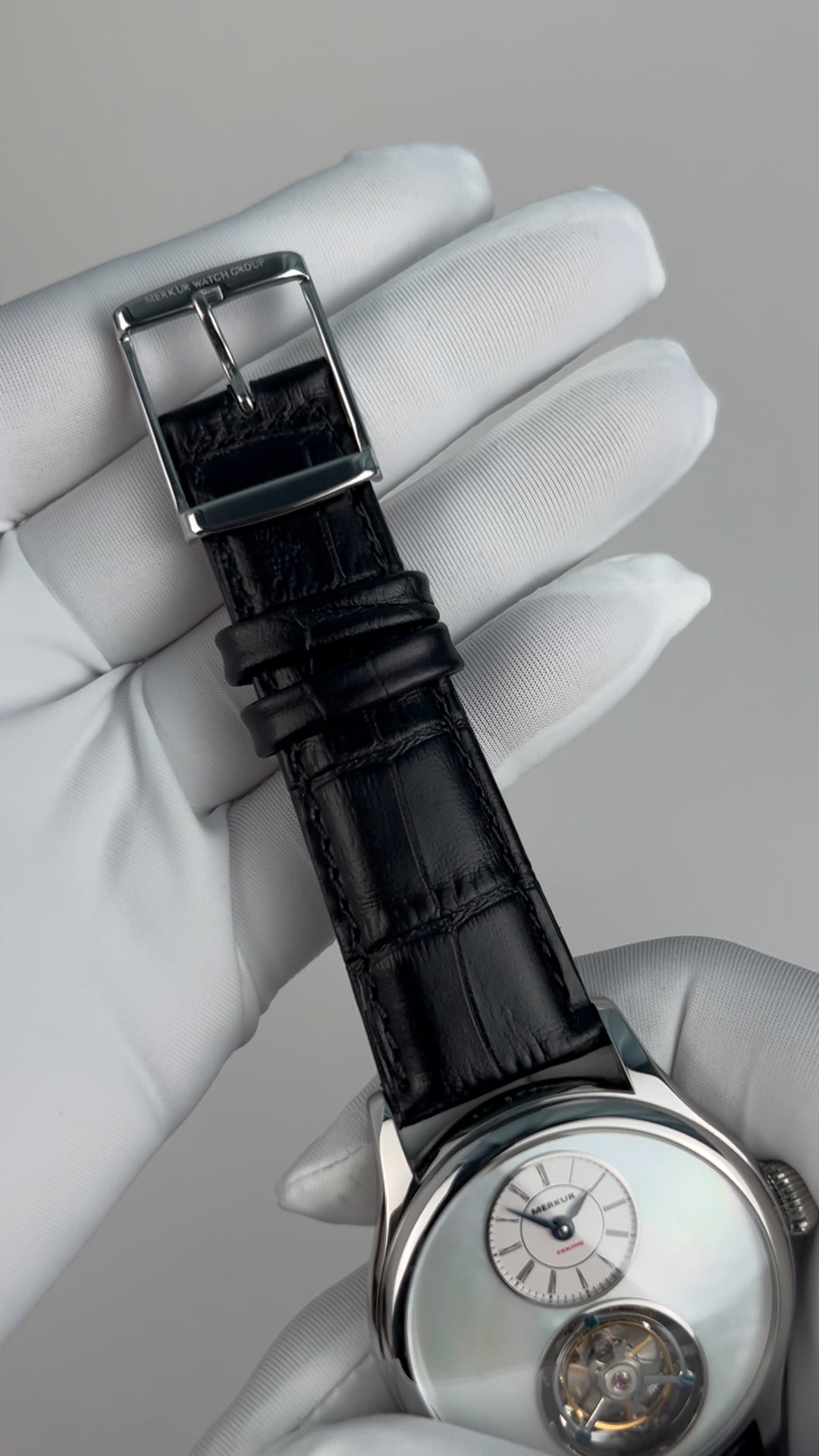 Tourbillon · white mother-of-pearl
