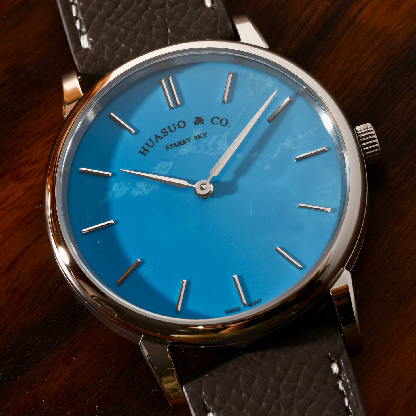 H003 · turquoise dial