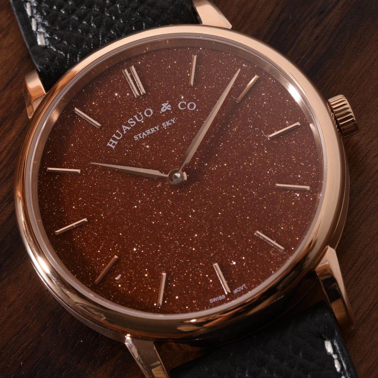 H003 · brown aventurine dial