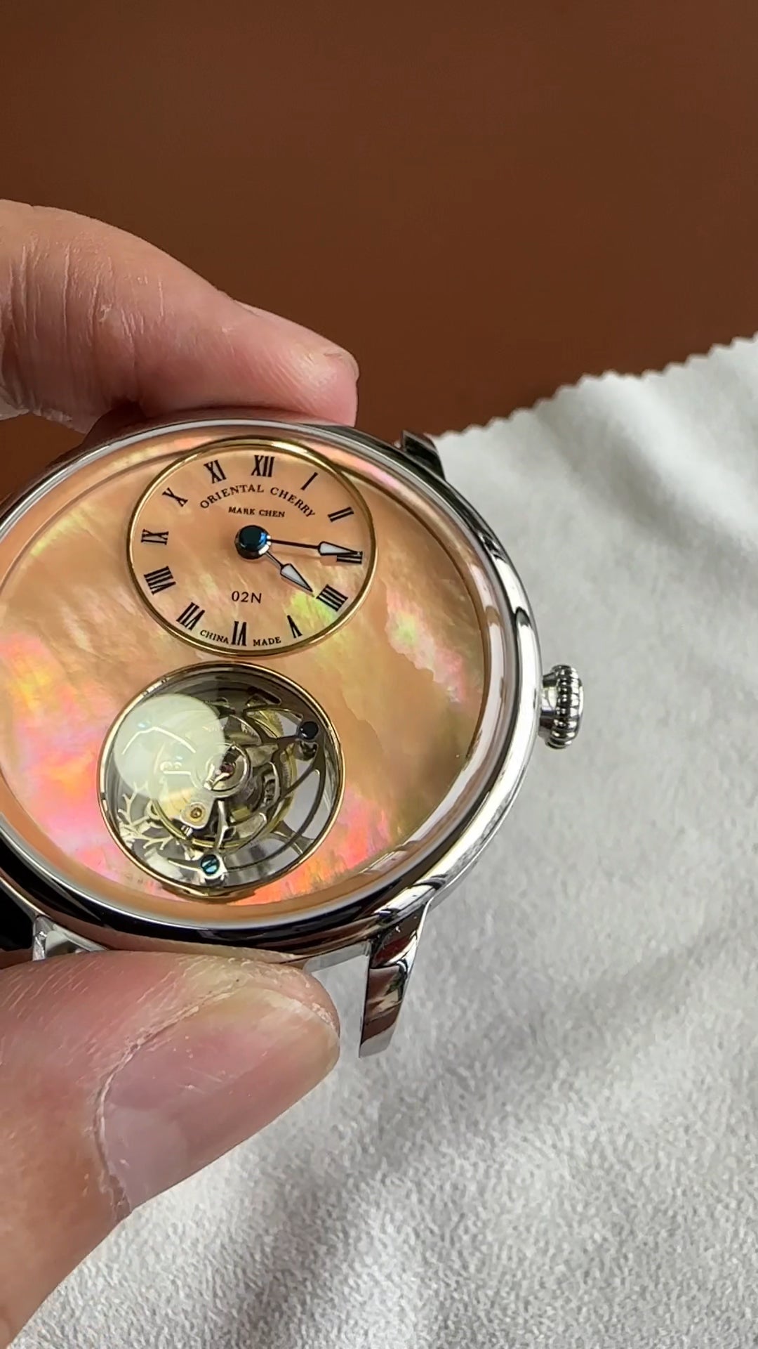Mark Chen 02N · mother-of-pearl dial · engraved back