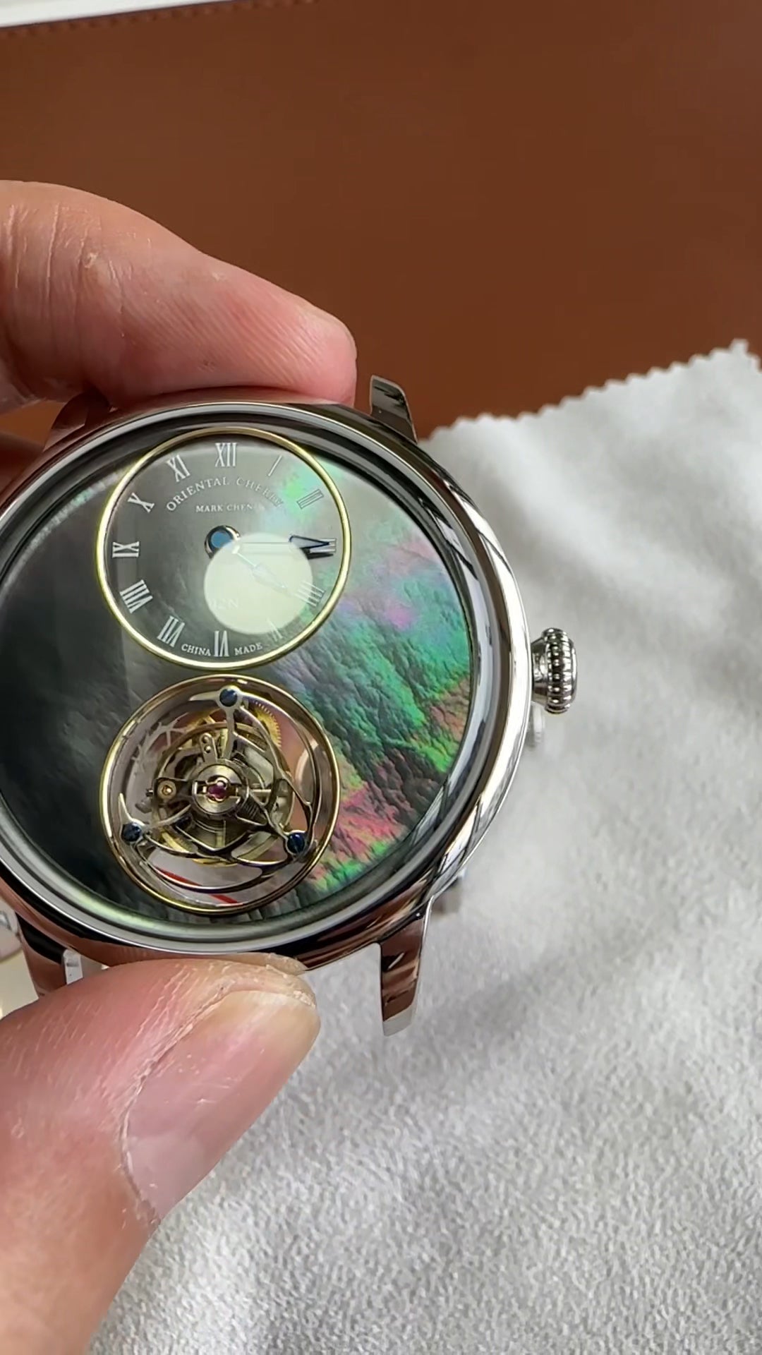 Mark Chen 02N · mother-of-pearl dial · engraved back