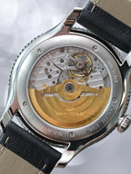 Designer Series · 904L steel · 18K gold logo