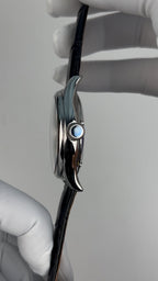 Tourbillon · white mother-of-pearl