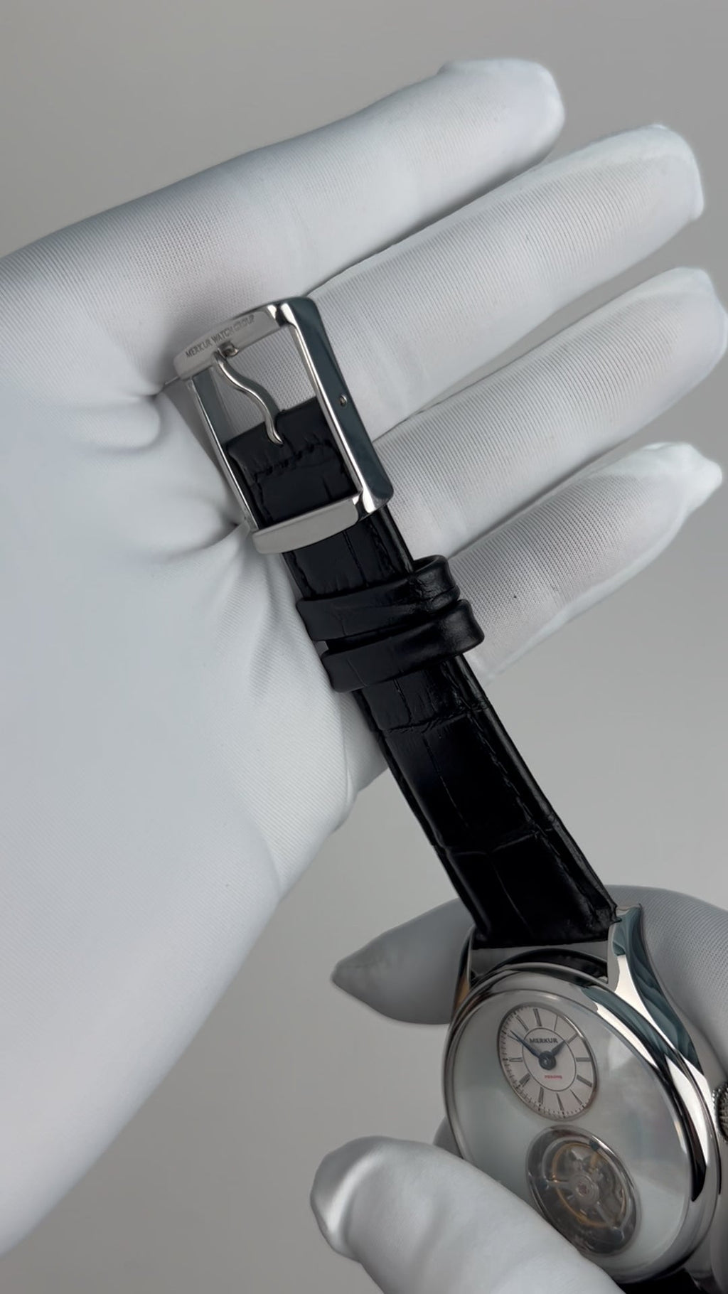 Tourbillon · white mother-of-pearl