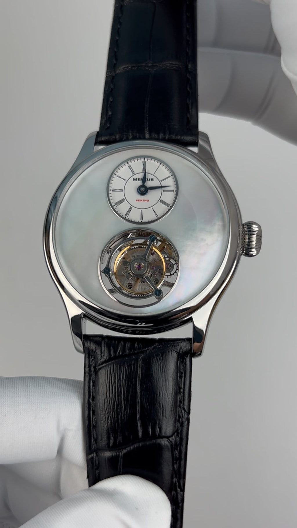 Tourbillon · white mother-of-pearl