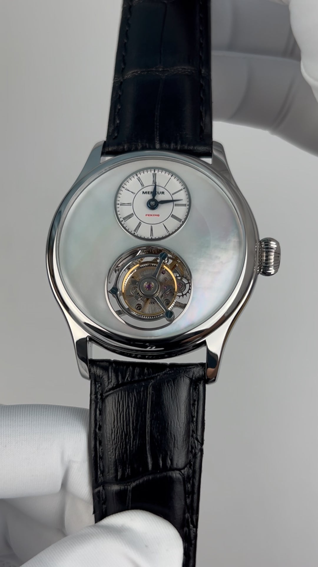 Tourbillon · white mother-of-pearl