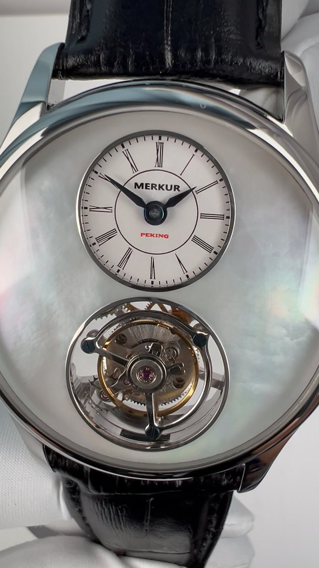 Tourbillon · white mother-of-pearl