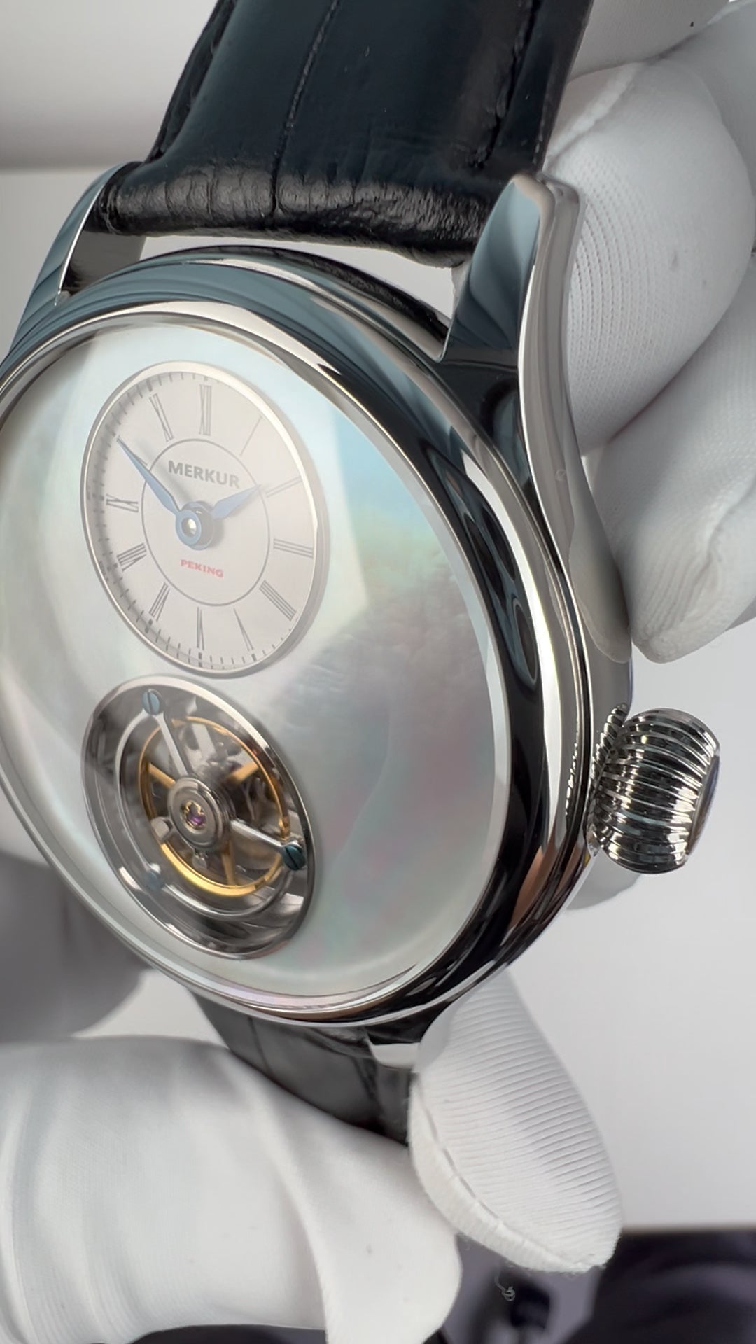 Tourbillon · white mother-of-pearl