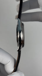 Tourbillon · white mother-of-pearl