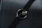 Mark Chen 05S · domed · black goldstone