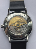 Water Drop II · 904L steel · 18K gold logo