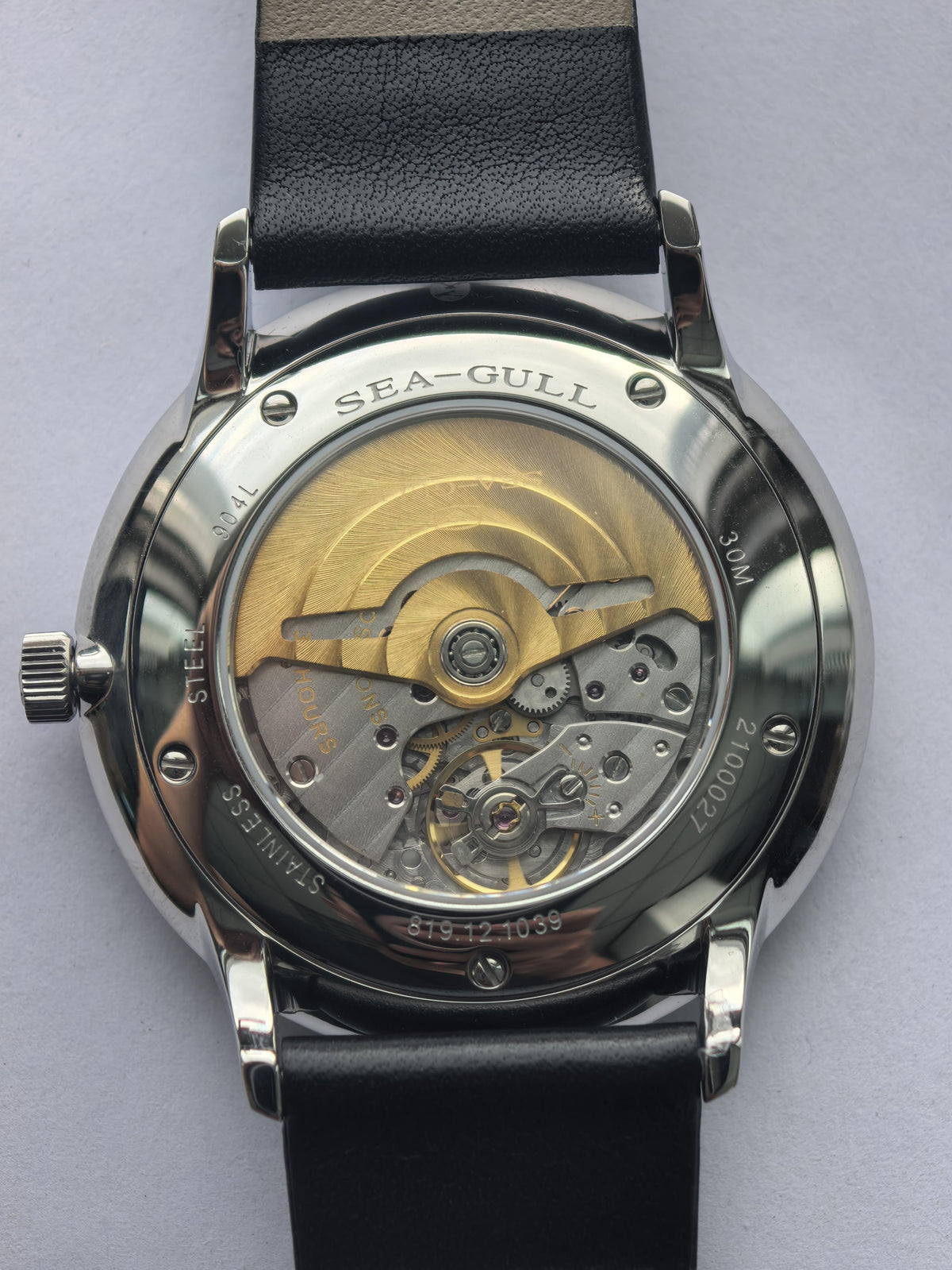 Water Drop II · 904L steel · 18K gold logo