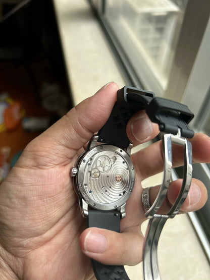 MC-03 · obsidian dial