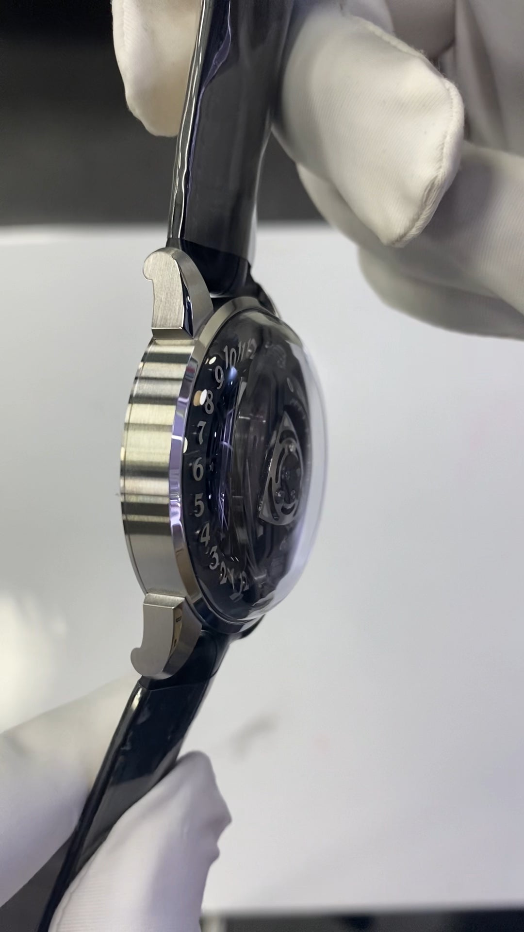 Rotary · black dial · leather strap