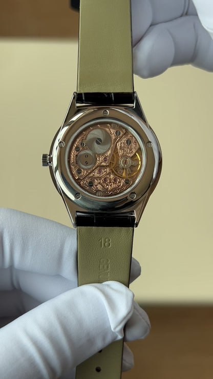 Turquoise dial watch · ETA7001 decorated