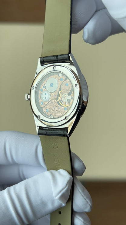 Turquoise dial watch · ETA7001 decorated